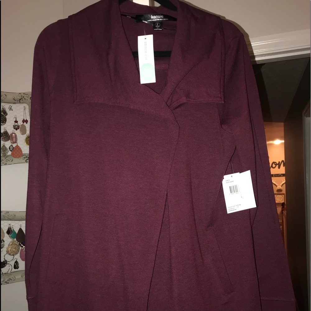 With tags never worn wine one snap knit top.